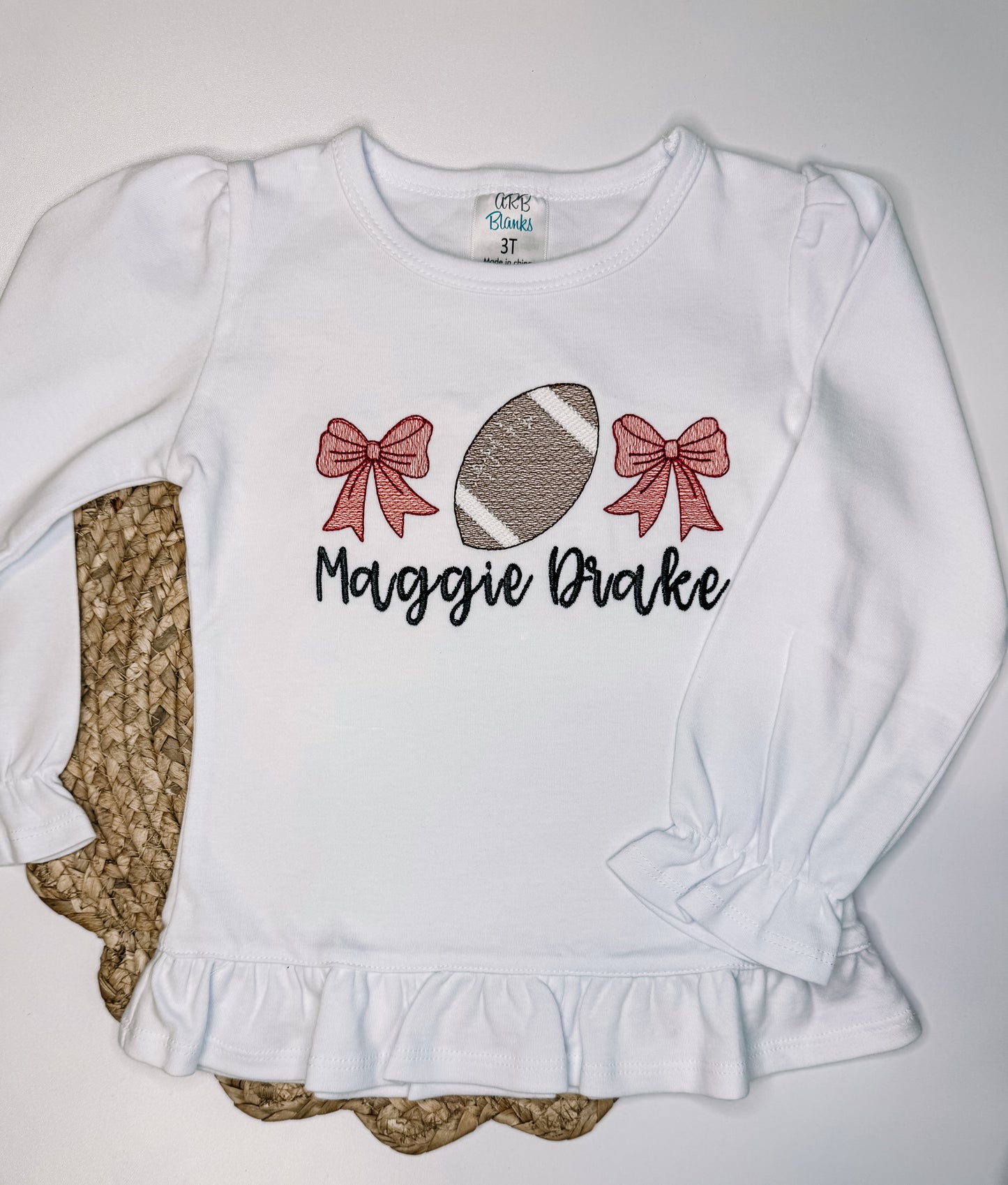 Football and Bows Game Day Girls Long Sleeve Ruffle Shirt